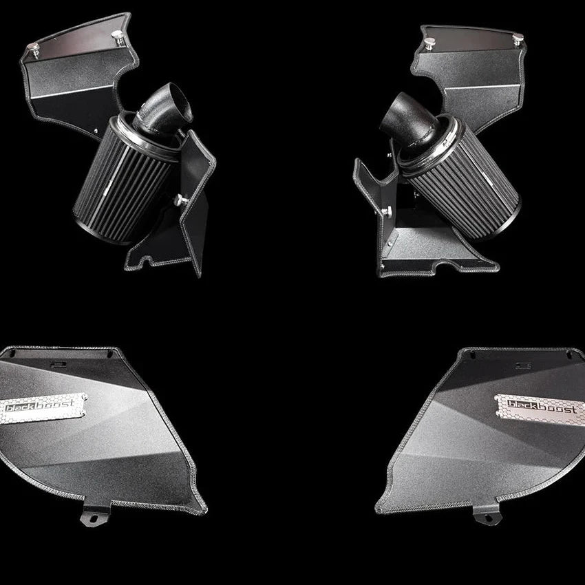 Aulitzky Blackboost Cold Air Intake Ansaugsystem für BMW M850i G15, schwarzes Edelstahl, montiert im Motorraum.