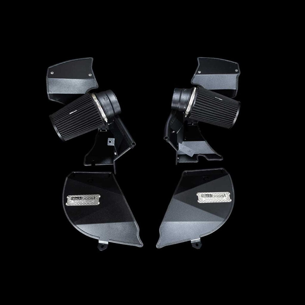 Schwarzes Blackboost Cold Air Intake Ansaugsystem für BMW M5/M8 F9x, Aulitzky, zeigt das Ansaugrohr und Filterelement.