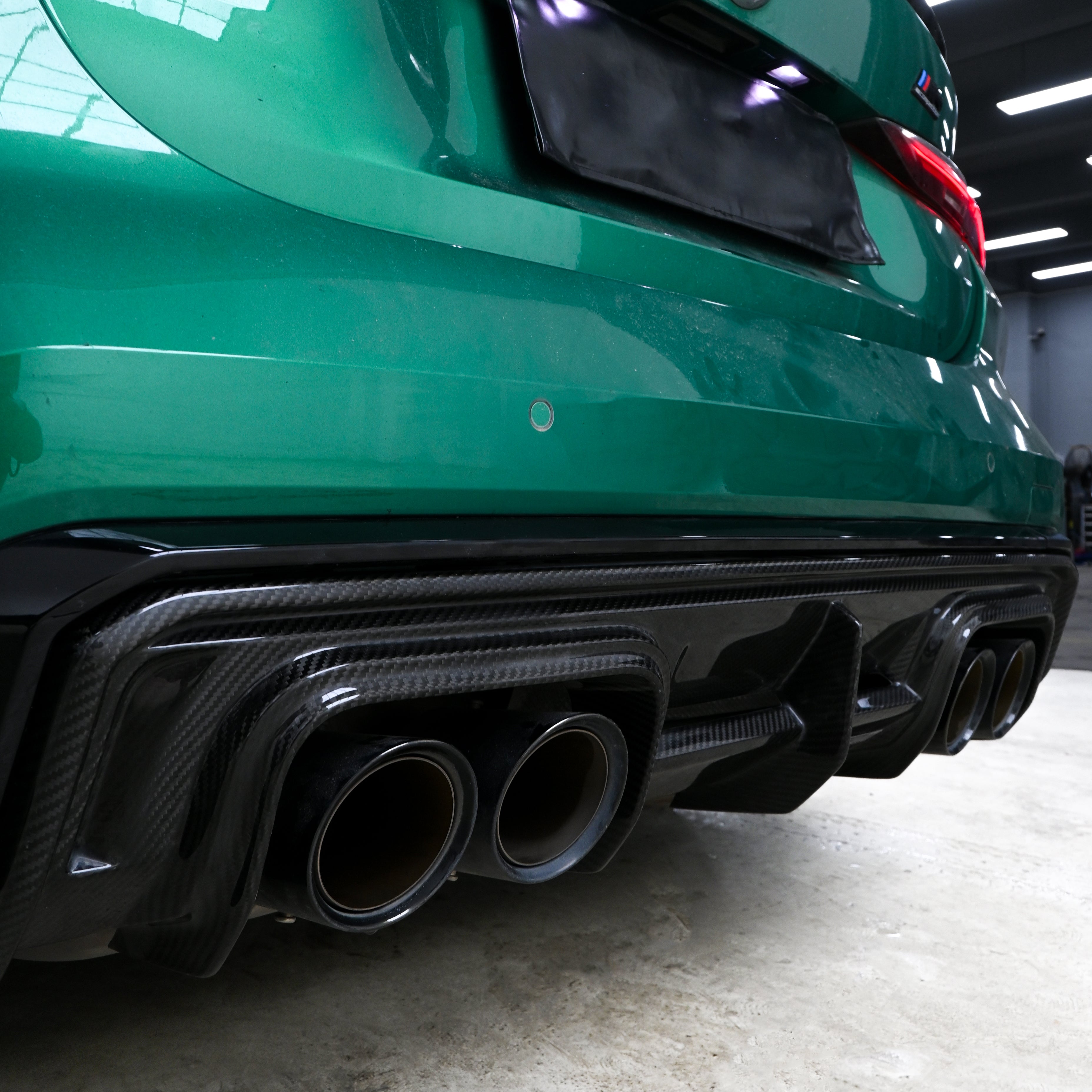 Carbon Heckdiffusor im V-Style passend für BMW M3 G80/G81 und M4 G82/G83, Echtcarbon - Getsdowned